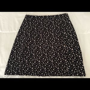 NEW! Black Brandy Melville skirt with flowers.